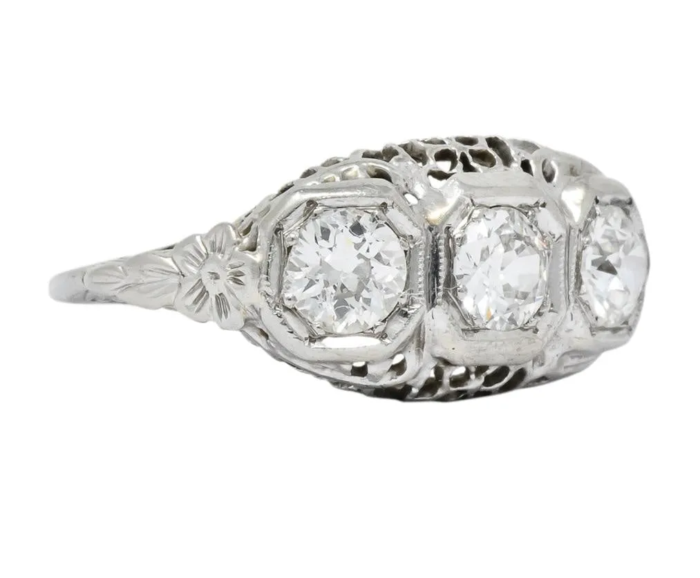 Edwardian 1.00 CTW Diamond Platinum-Topped 14 Karat White Gold Three Stone Ring