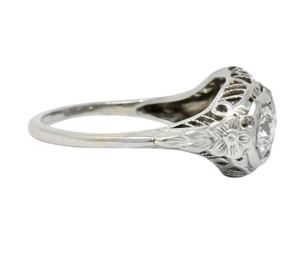 Edwardian 1.00 CTW Diamond Platinum-Topped 14 Karat White Gold Three Stone Ring