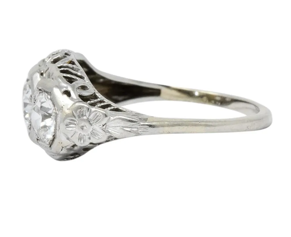 Edwardian 1.00 CTW Diamond Platinum-Topped 14 Karat White Gold Three Stone Ring