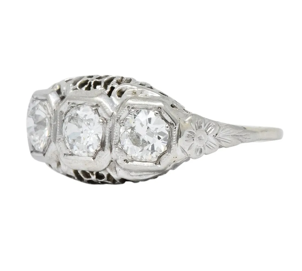 Edwardian 1.00 CTW Diamond Platinum-Topped 14 Karat White Gold Three Stone Ring