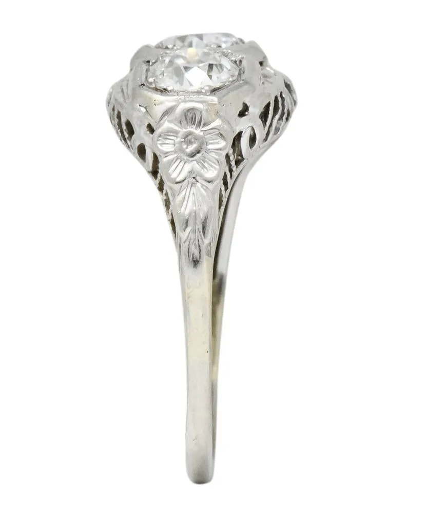 Edwardian 1.00 CTW Diamond Platinum-Topped 14 Karat White Gold Three Stone Ring