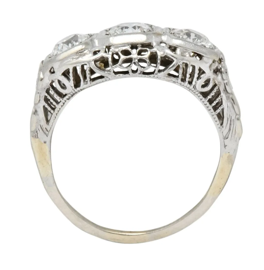 Edwardian 1.00 CTW Diamond Platinum-Topped 14 Karat White Gold Three Stone Ring