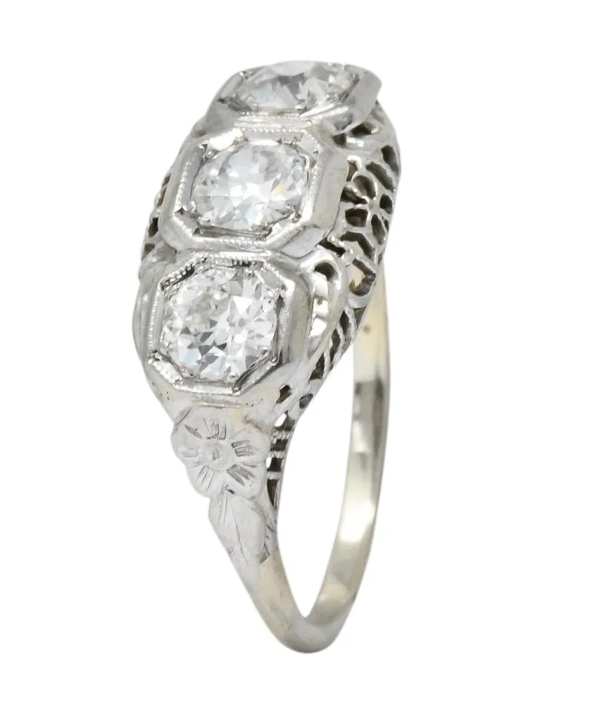 Edwardian 1.00 CTW Diamond Platinum-Topped 14 Karat White Gold Three Stone Ring